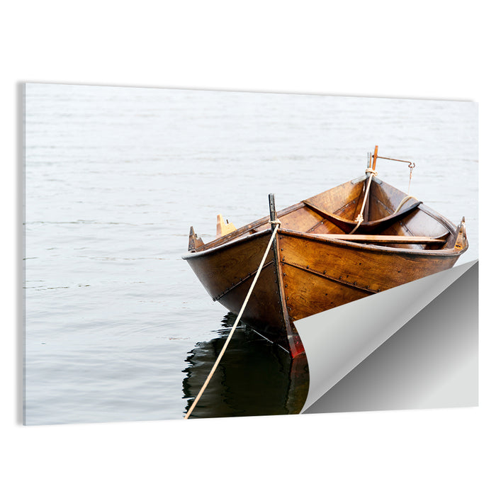 Tethered Wooden Rowboat on Calm Water Wall Art as a poster print