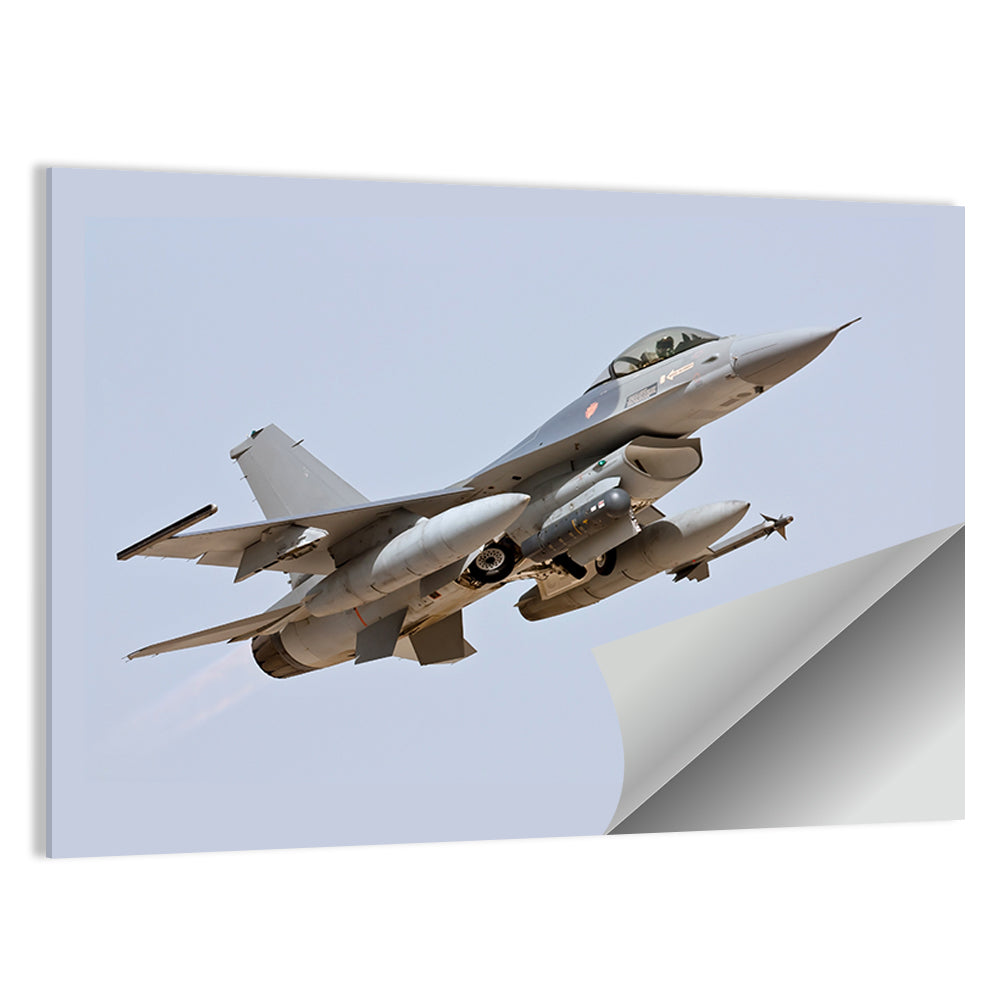 F-16 Fighter Jet Banking Over Sky Wall Art