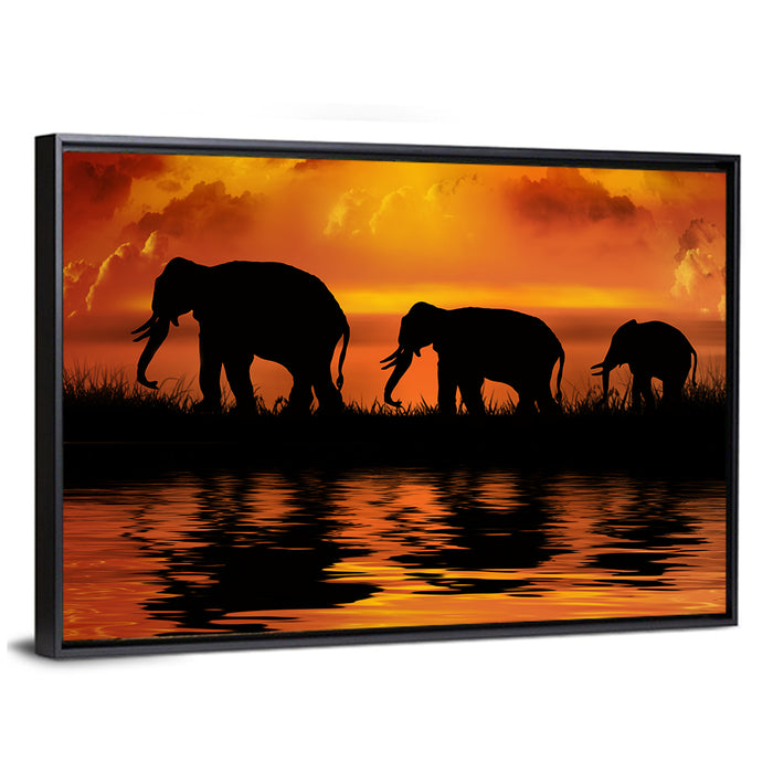 Elephants at Sunset Wall Art as a framed canvas