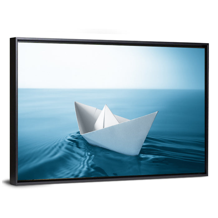 Paper Sailboat on Blue Water Wall Art as a framed canvas