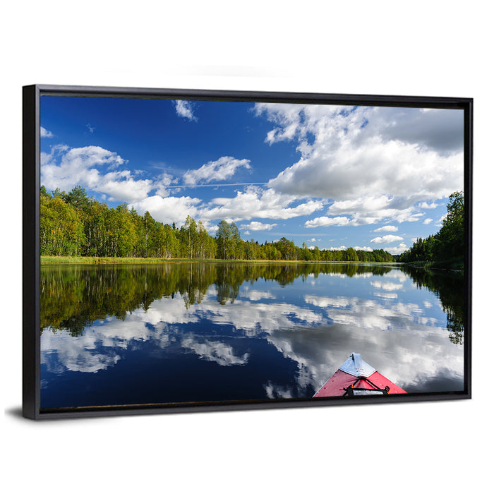 Red Kayak on Calm Lake Wall Art as a framed canvas