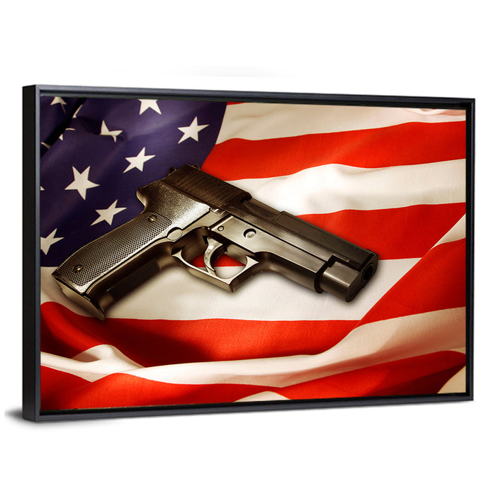Pistol on Folded American Flag Wall Art as a framed canvas