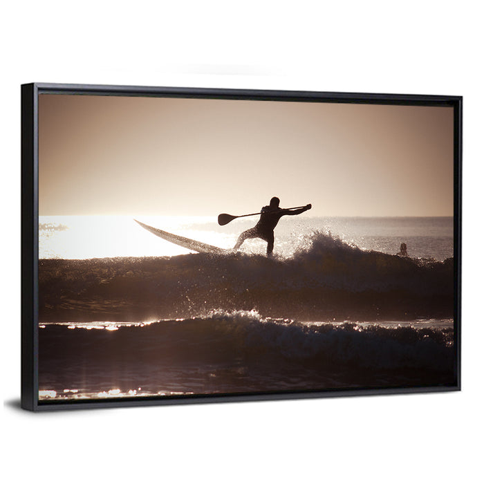 Backlit Paddleboard Silhouette at Sunrise Wall Art as a framed canvas