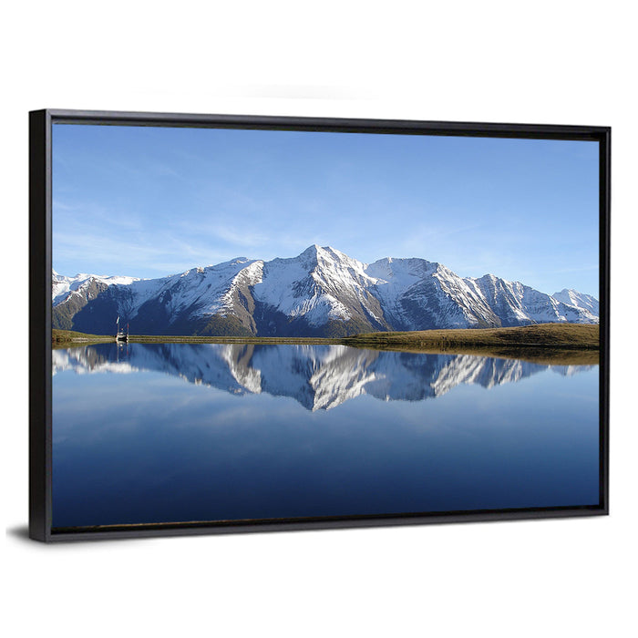 Bettmersee Mountain Reflection Wall Art as a framed canvas