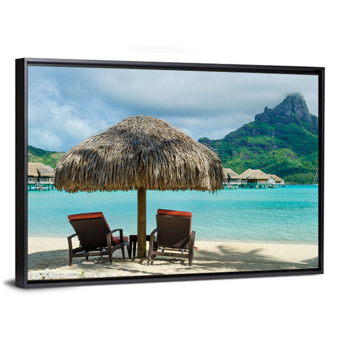 Bora Bora Lagoon with Thatched Umbrella Wall Art as a framed canvas