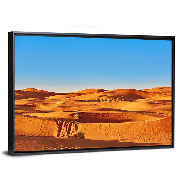 Sunlit Sahara Dunes with Camel Caravan Wall Art
