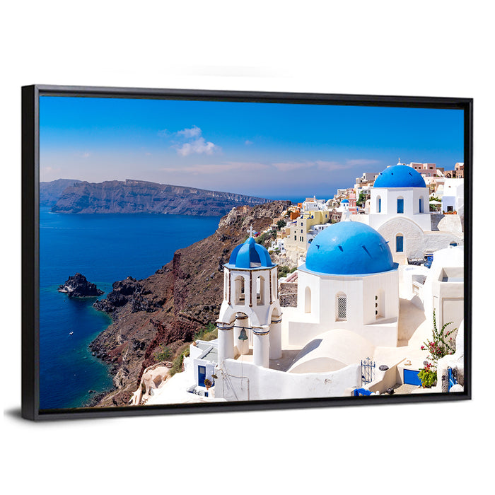 Blue Dome Churches of Oia, Santorini Wall Art as a framed canvas