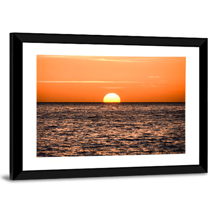 Sunset Over Open Ocean Wall Art as a framed print
