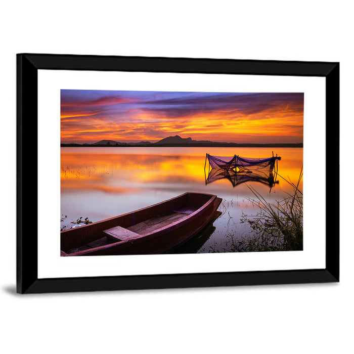 Boat Near Fishing Net at Sunset Wall Art as a framed print