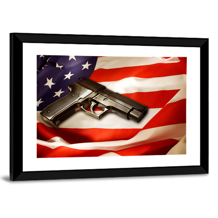 Pistol on Folded American Flag Wall Art as a framed print