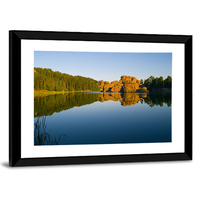 Sylvan Lake Golden Hour Reflection Wall Art as a framed print