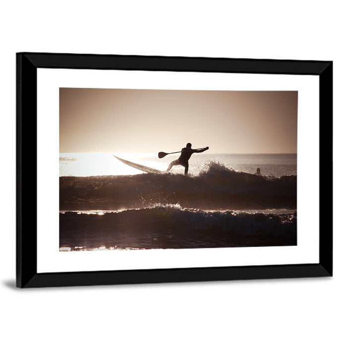 Backlit Paddleboard Silhouette at Sunrise Wall Art as a framed print