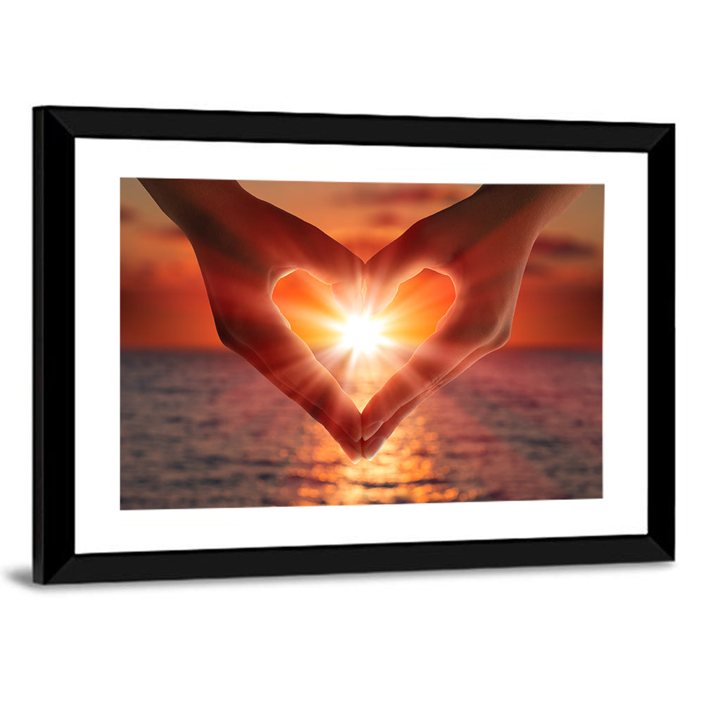 Hands Forming Heart at Sunset Wall Art