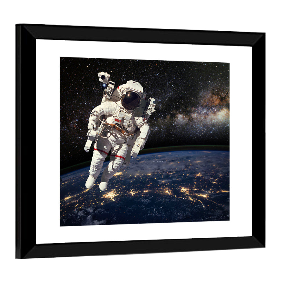 Astronaut Above Earth Horizon Wall Art