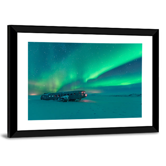Northern Lights Over Sólheimasandur Wreck Wall Art as a framed print