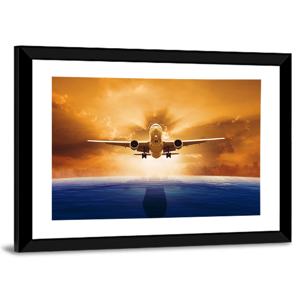 Landing Jet Over Ocean at Sunset Wall Art
