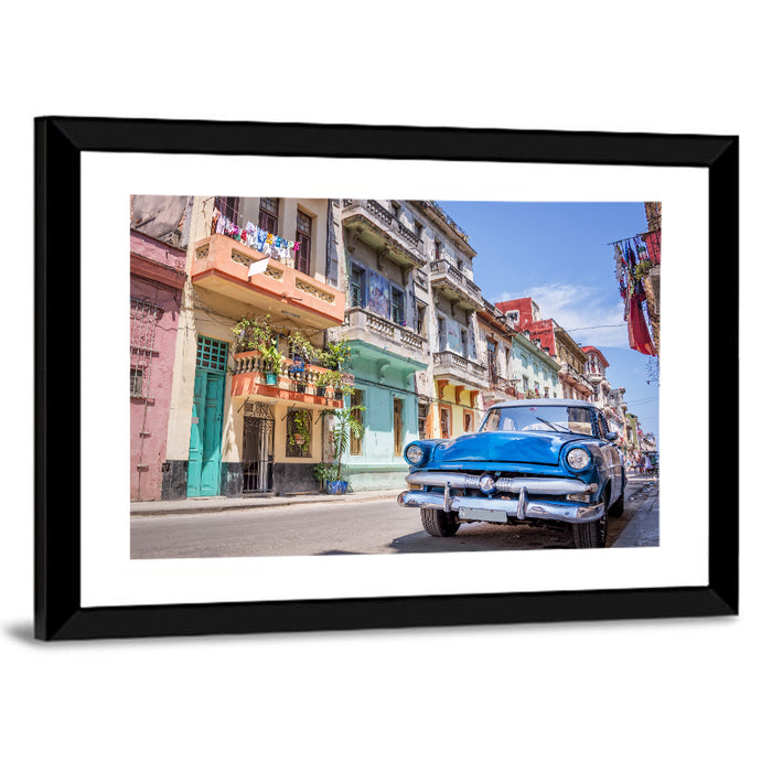 Vintage American Car on Colorful Street Wall Art as a framed print