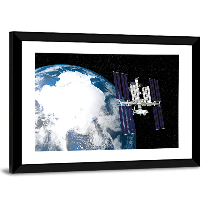 Iss Over Antarctica Wall Art as a framed print