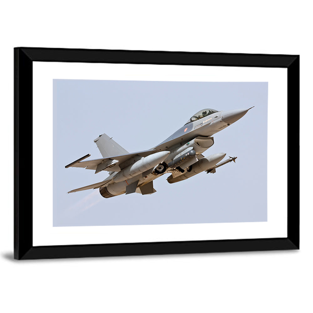 F-16 Fighter Jet Banking Over Sky Wall Art