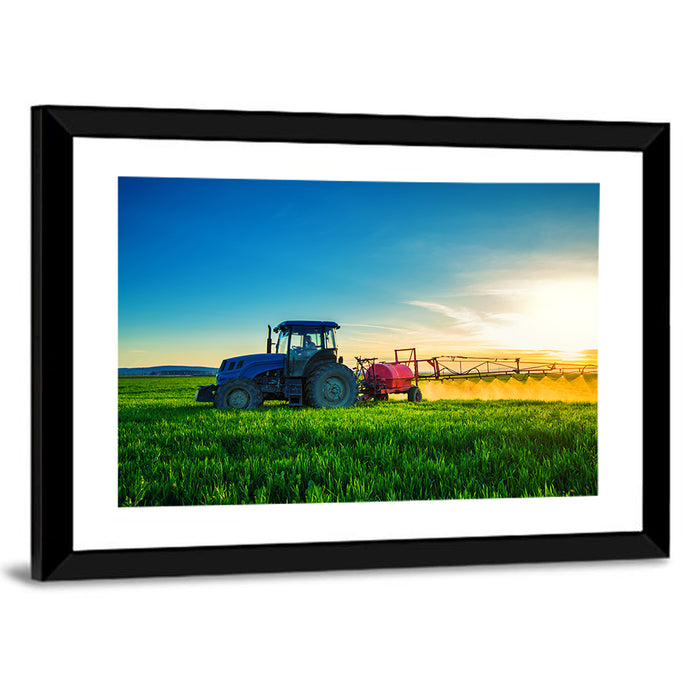 Tractor Spraying Crops at Golden Hour Wall Art as a framed print