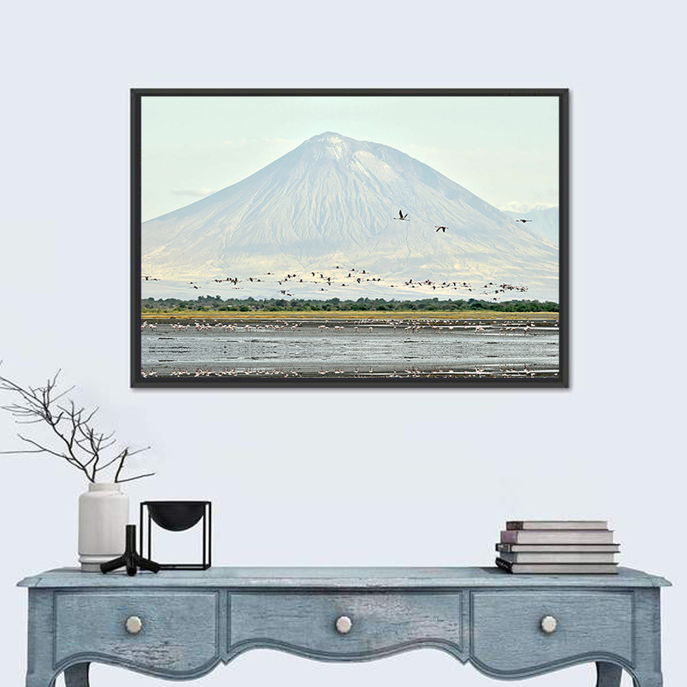 Flamingos Over Lake Natron, Doinyo Lengai Wall Art in a room, landscape