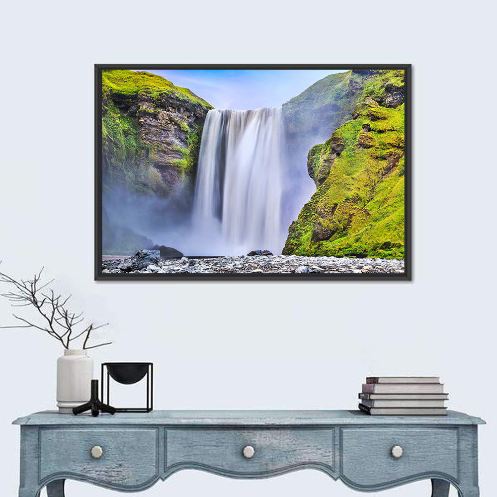 Mossy Skógafoss Waterfall Wall Art in a room, landscape