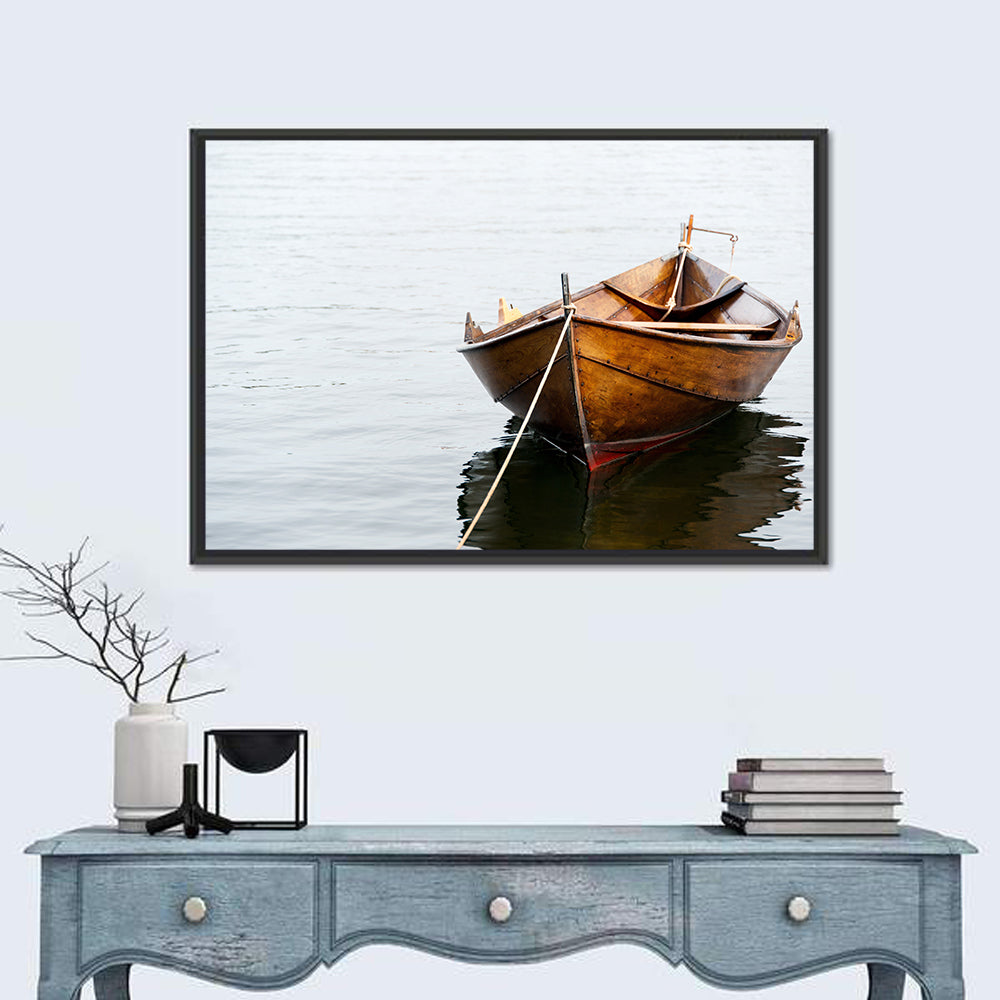 Tethered Wooden Rowboat on Calm Water Wall Art