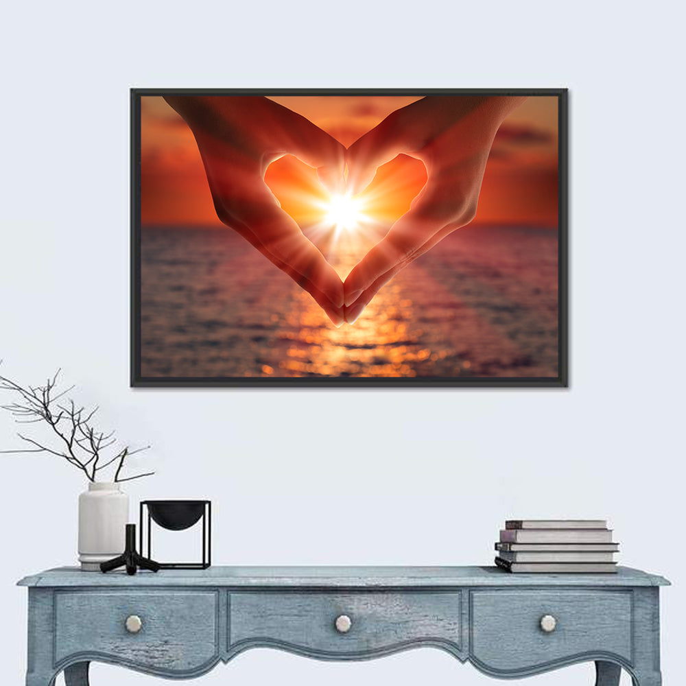 Hands Forming Heart at Sunset Wall Art in a room, landscape
