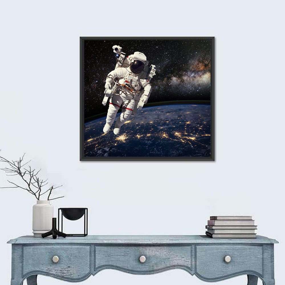 Astronaut Above Earth Horizon Wall Art