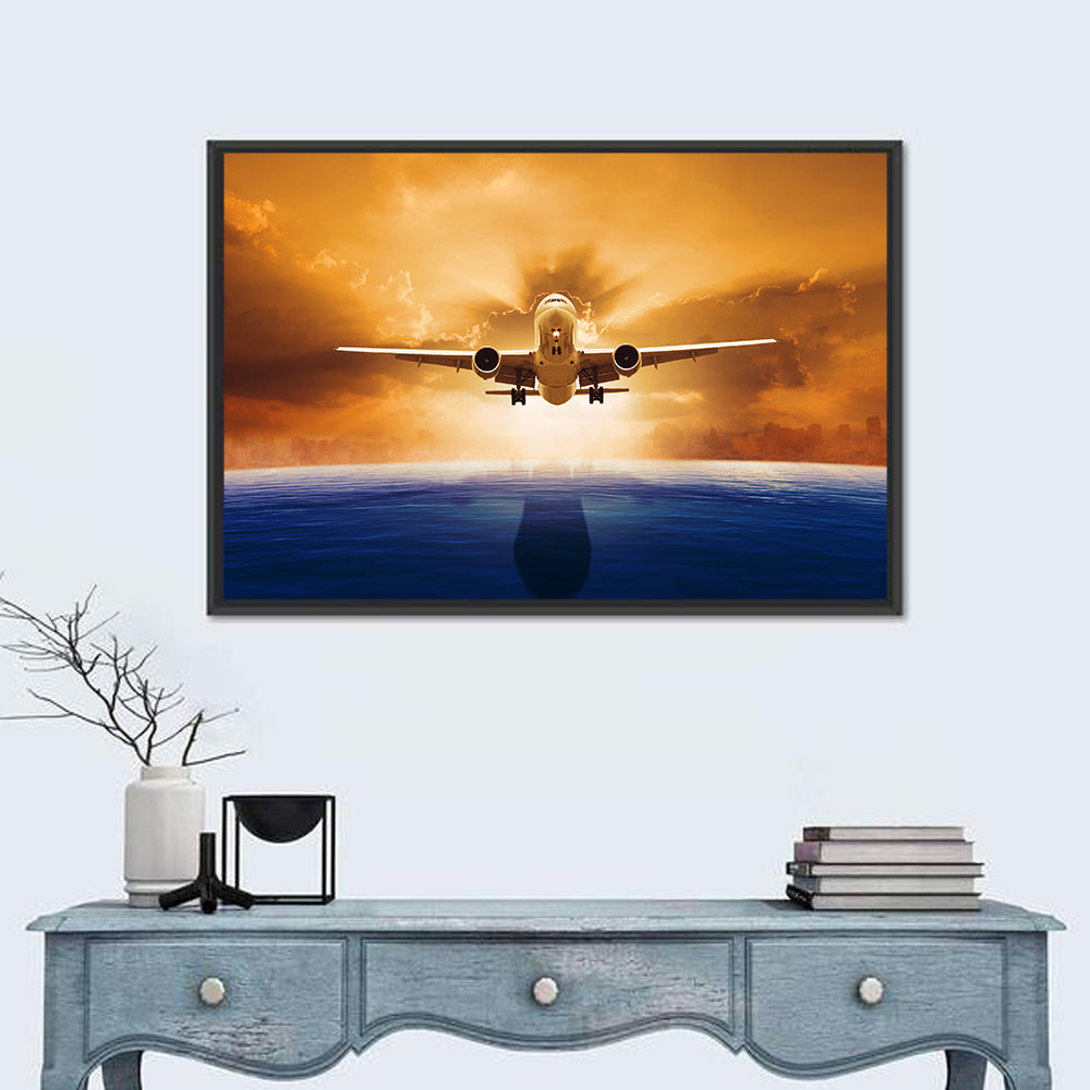 Landing Jet Over Ocean at Sunset Wall Art
