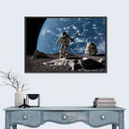 Astronaut on Cratered Planet Wall Art