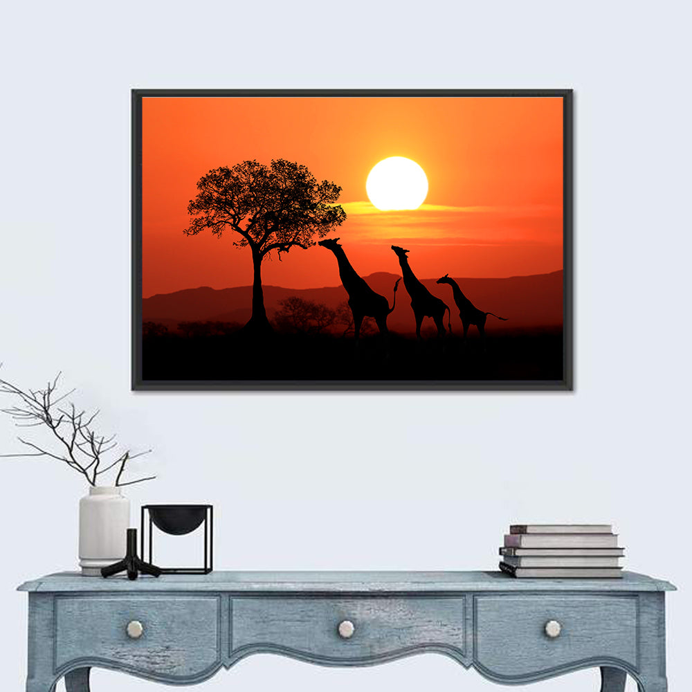 Three Giraffes at Sunset Wall Art in a room, landscape