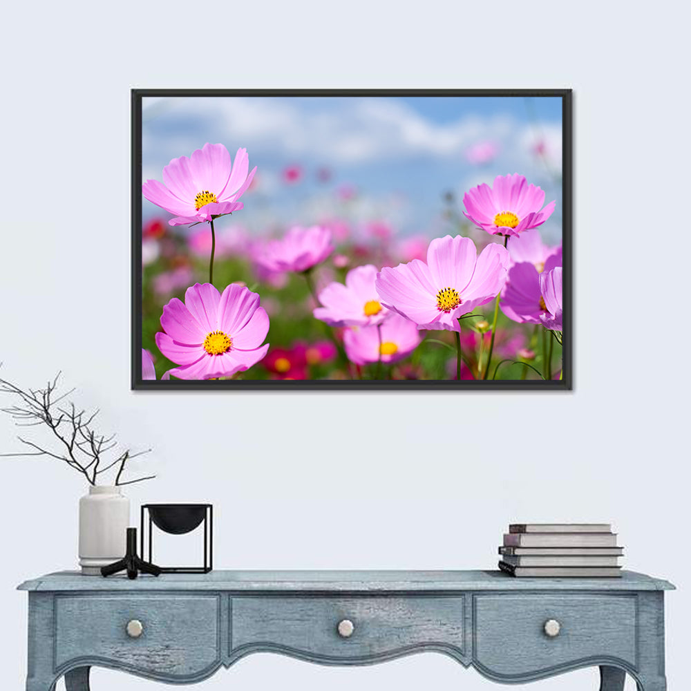 Pink Cosmos Meadow Under Blue Sky Wall Art in a room, landscape