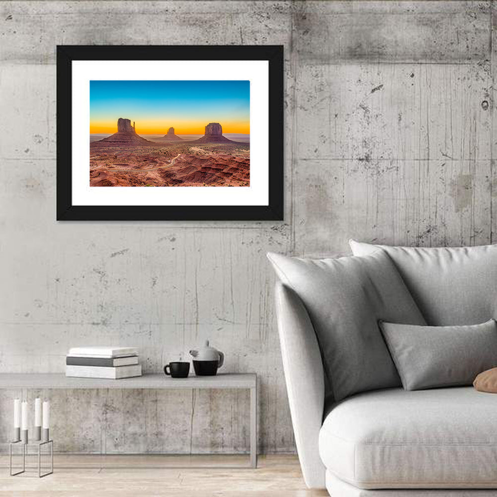 Monument Valley Sunrise with Winding Road Wall Art in a room, landscape