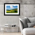 Sunlit Haystacks on Rolling Grassy Hills Wall Art