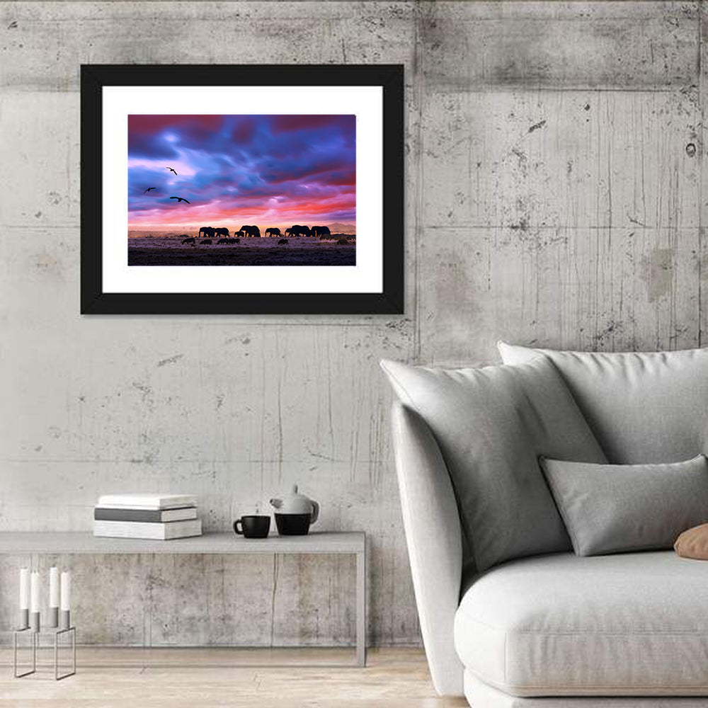 Elephants at Savannah Sunset Wall Art in a room, landscape