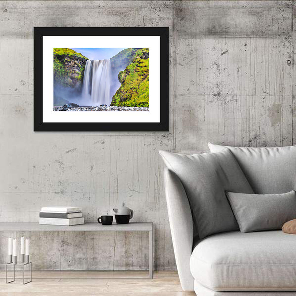Mossy Skógafoss Waterfall Wall Art in a room, landscape