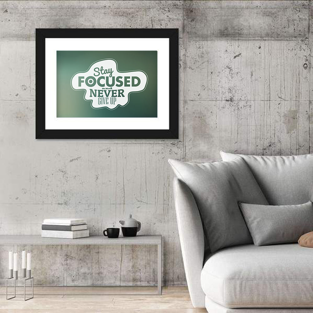 Stay Focused Never Give Up Typography Wall Art in a room, landscape