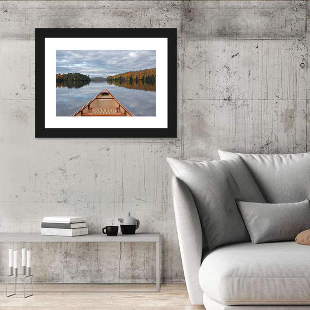 Overcast Canoe Bow on Autumn Lake Wall Art in a room, landscape