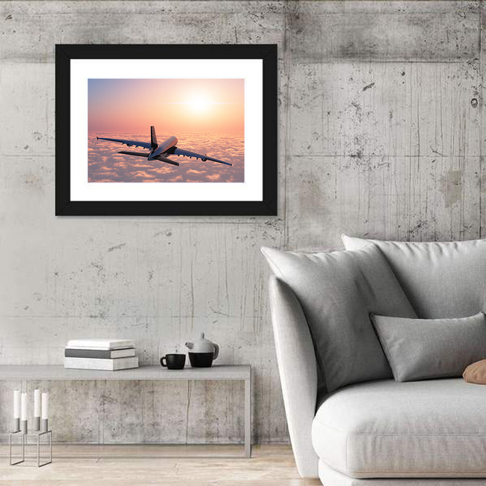 Passenger Plane Above Golden Clouds Wall Art