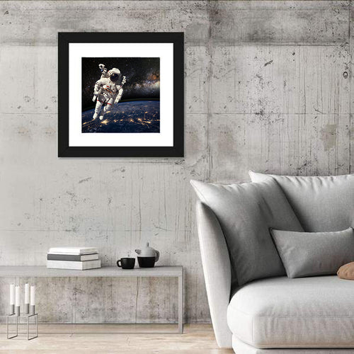 Astronaut Above Earth Horizon Wall Art