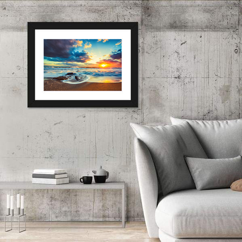 Sunrise Cloudscape Over Rocky Shore Wall Art in a room, landscape
