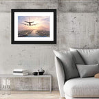 Airplane Over Island at Sunset Wall Art