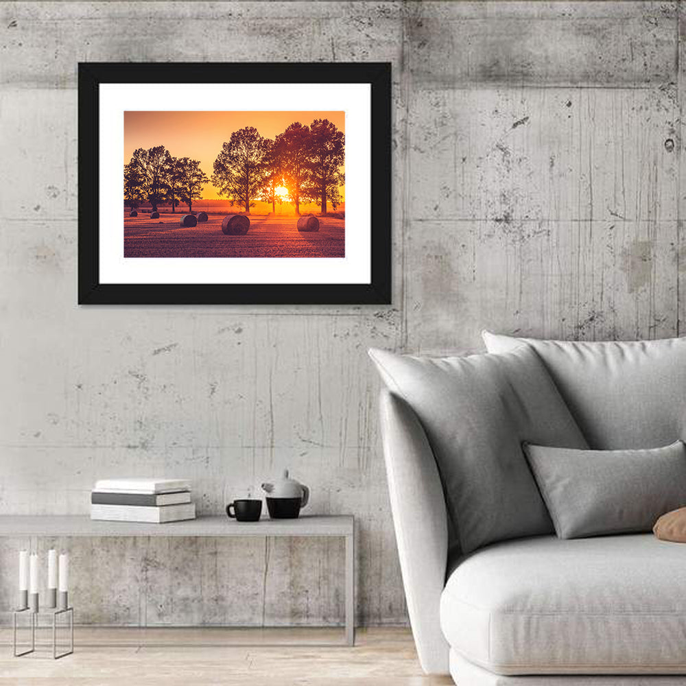 Sunset Over Hay Bales Wall Art in a room, landscape