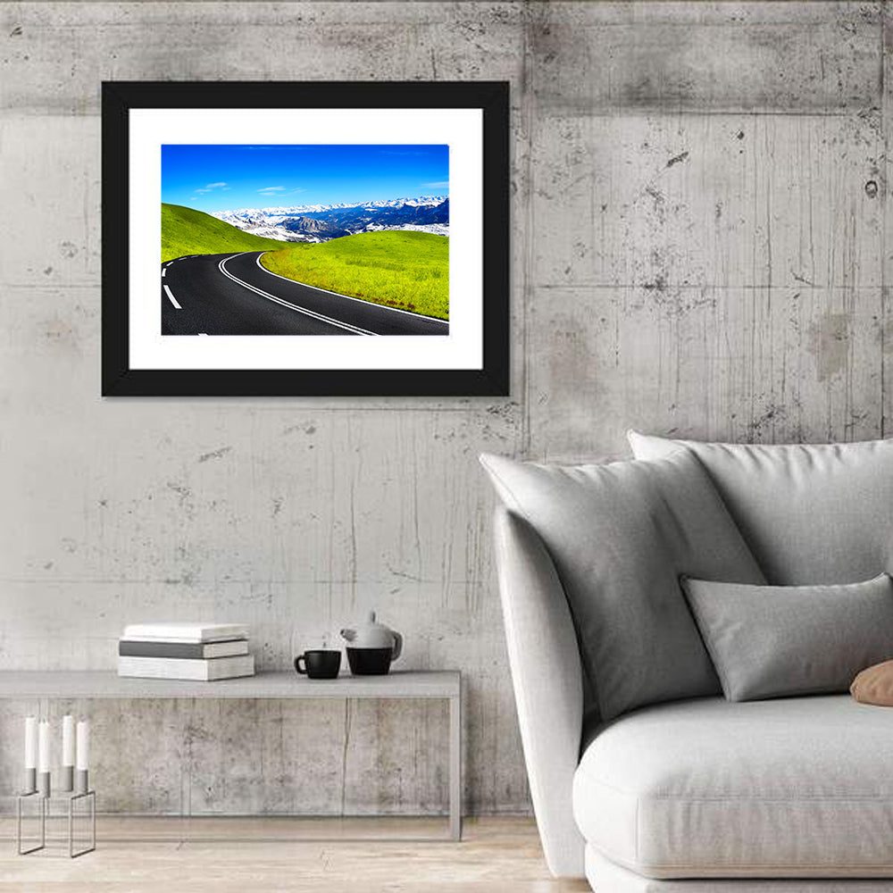 Winding Road Through Snow-capped Mountains Wall Art