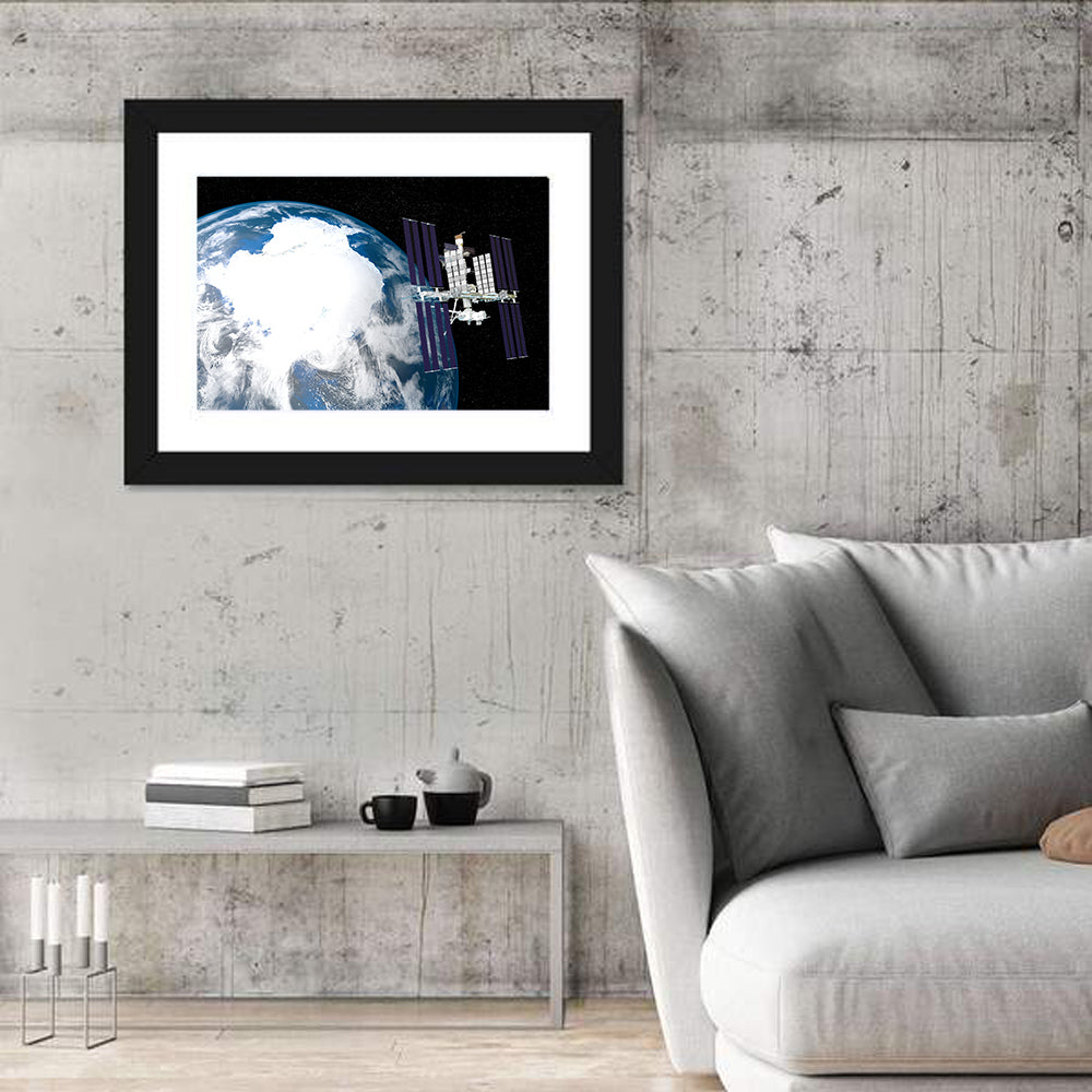 Iss Over Antarctica Wall Art in a room, landscape