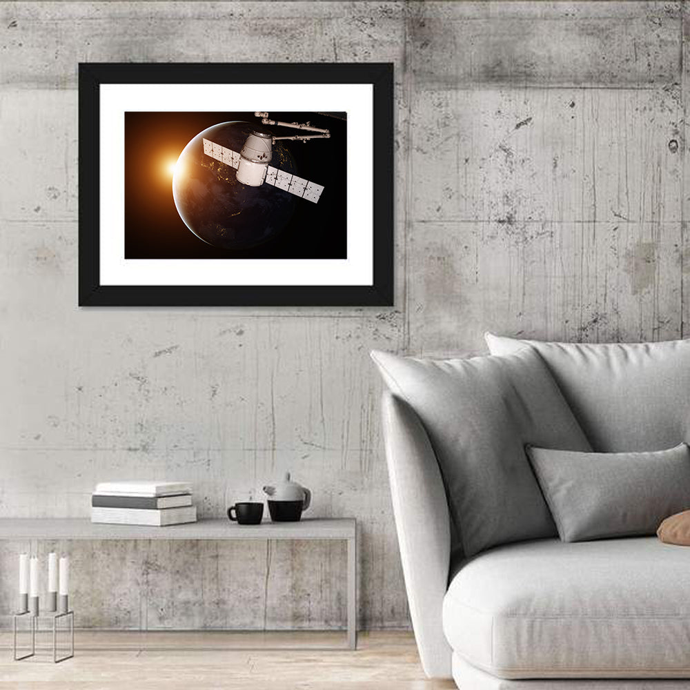 Satellite Over Earth at Sunrise Wall Art in a room, landscape