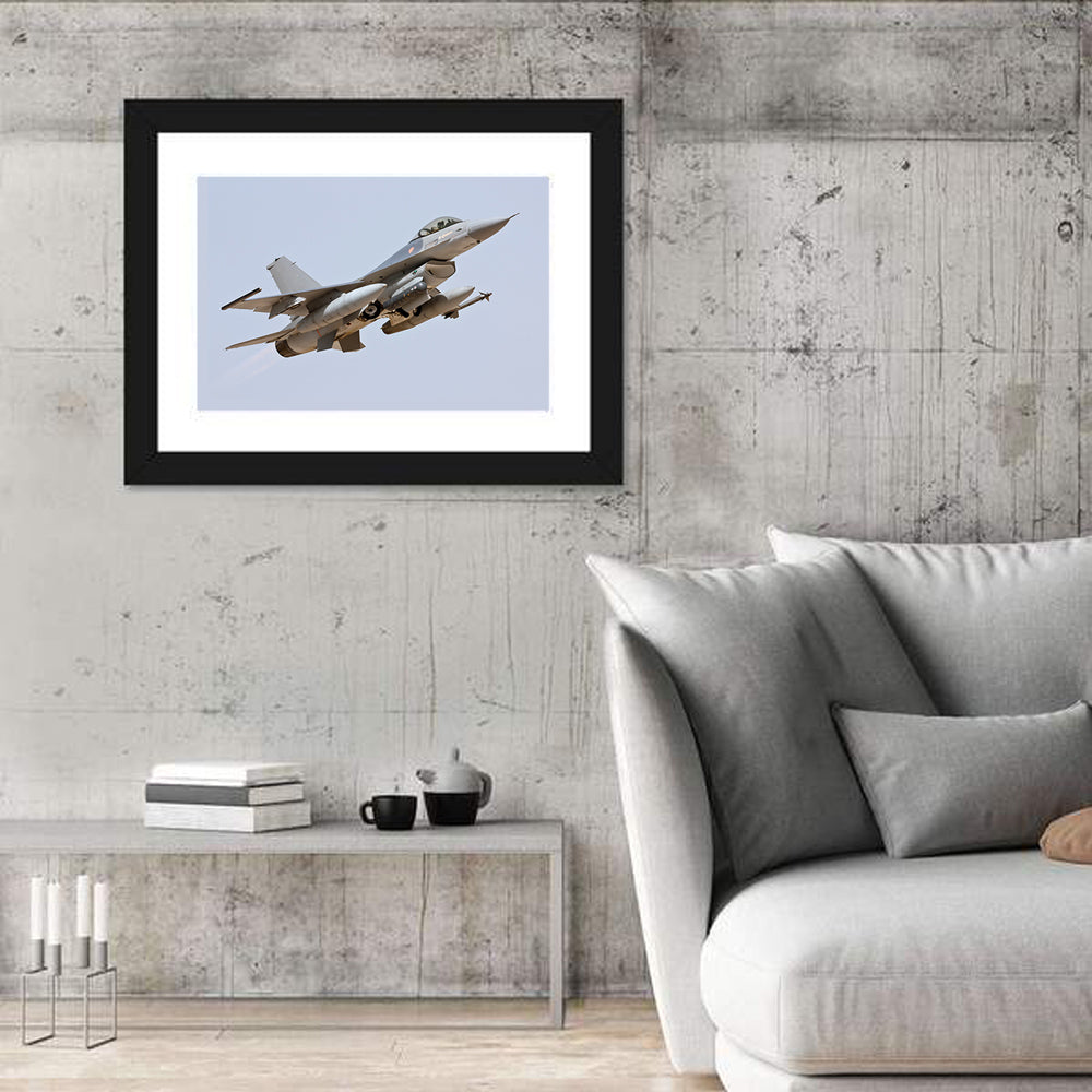 F-16 Fighter Jet Banking Over Sky Wall Art in a room, landscape
