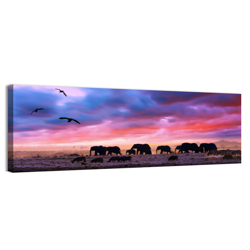 Elephants at Savannah Sunset Wall Art in a room, panoramic