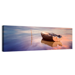 Lonely Boat At Sunset Wall Art